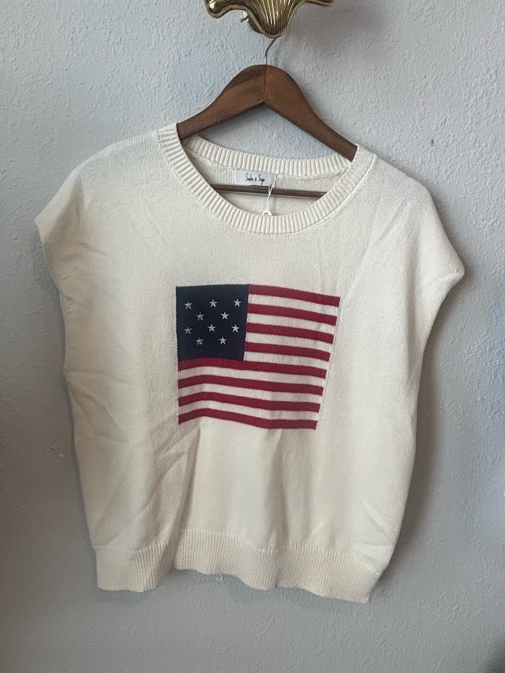 Sadie & Sage Cream Sleeveless Crewneck Sweater with Flag Graphic